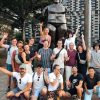 Group of people posing with statue during Medellin Local Food Tour