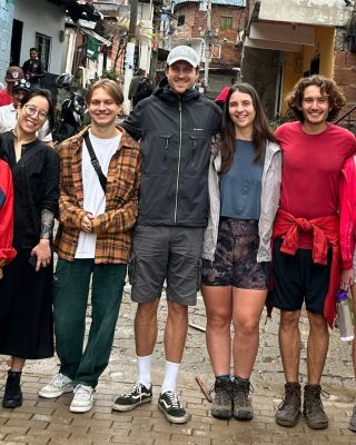 Visitors exploring Moravia Cultural Center during Medellin Barrio Moravia Tour