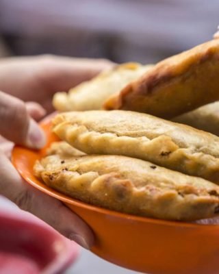 Family-style dining during Medellin Local Food Tour