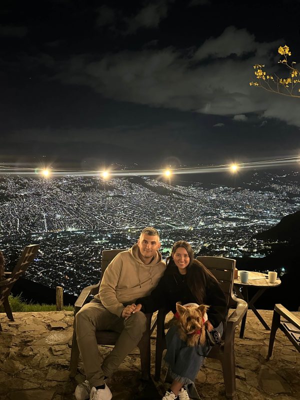 Goran and Tatiana overlooking Medellín’s sparkling city lights at night – Medellin Travel Guide