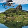 Helicopter flight over Guatape lake and El Penol rock