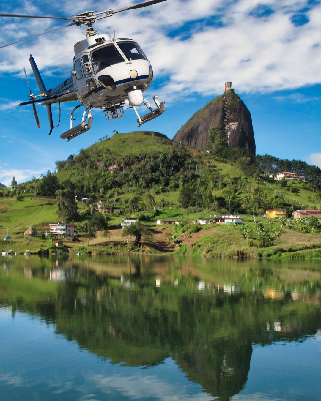 Helicopter flight over Guatape lake and El Penol rock