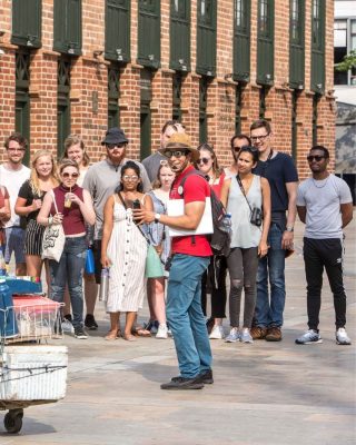Group exploring Medellin downtown with local guide