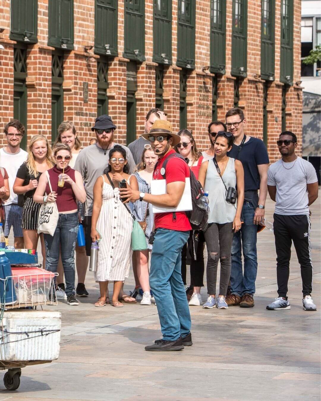 Group exploring Medellin downtown with local guide