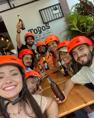 Group on e-bikes exploring Medellín’s best street food spots