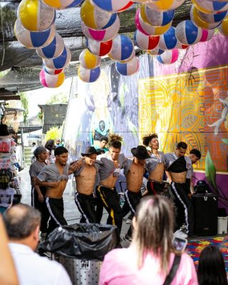 Street artists dancing during a Comuna 13 tour.