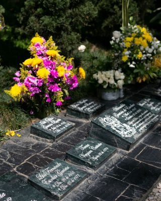 Visitors the grave of Pablo Escobar during a tour.