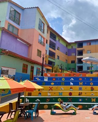 View of Guatape’s zócalos and vibrant houses during private guatape tour from Medellin