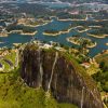 View of El Peñol rock and Guatape lake on a scenic day trip from Medellin.