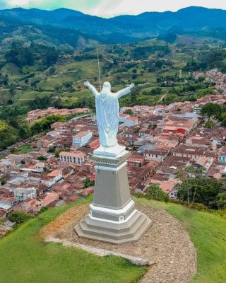 Traveler visiting the Cristo Rey viewpoint in Jerico