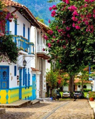 Colorful houses with blooming flowers in jerico Antioquia
