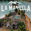 Drone view of Finca La Manuela ruins by Guatape lake.
