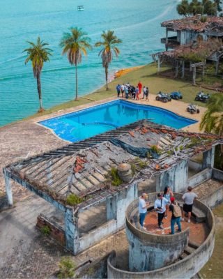 anoramic photo capturing the beauty of Guatape’s lake and Pablo Escobars Finca La Manuela during Guatape Tour from Medellin