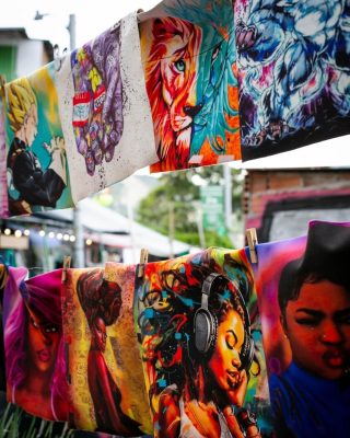 Colorful street art and escalators in Medellín’s Comuna 13 during a guided tour